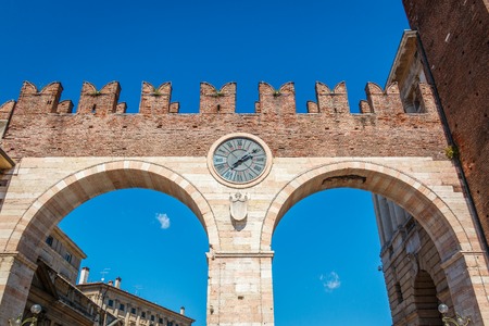 City gate of Verona with clock, Veneto, Italyの写真素材