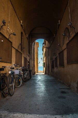 Alley from the old town in Piombino, Tuscany, Italy