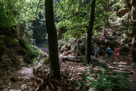 School trip in the holes of Sweden in the Elbsandsteingebirge in the Saxon Switzerlandの写真素材