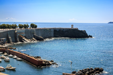 View on the terrace Giovanni Bovio and the Rocchetta lighthouse in Piombino, Tuscany, Italyのeditorial素材