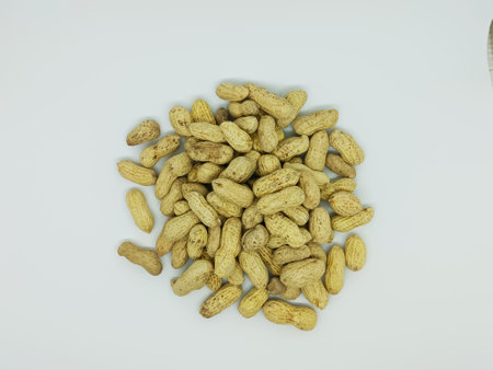 Peanuts on a white background. Close-up of peanuts.