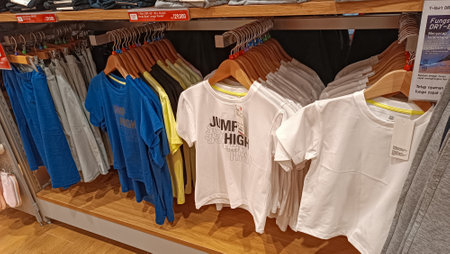 T-shirts on display at a store in Milan.の写真素材