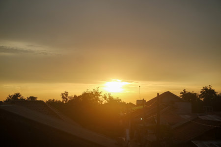Time lapse of beautiful sunrise over villageの写真素材