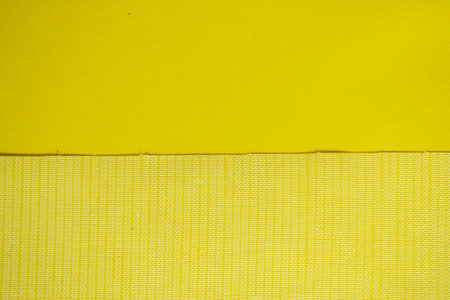 Yellow background textile with small textureの写真素材