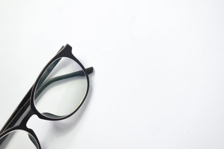 Black frame eyeglasses unisex isolated on white backgroundの写真素材