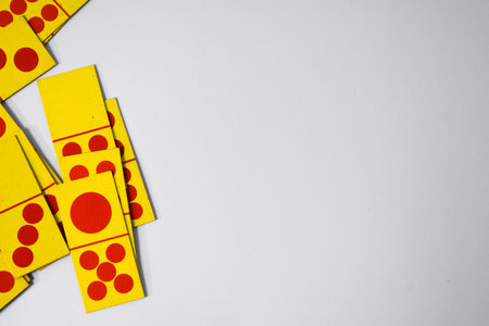 dominoes playing cards isolated white background, yellow red dominoes cardsの写真素材