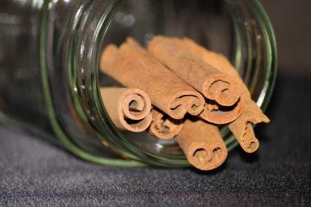 Cinnamon falling out from a jar