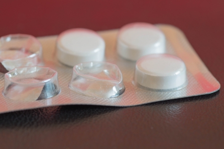 Coated pill containing a pill and empty slotの写真素材