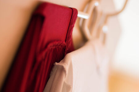 White and red dress hangingの写真素材