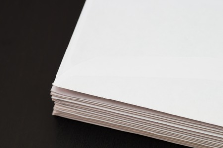 Envelopes bottom part on back backgroundの写真素材
