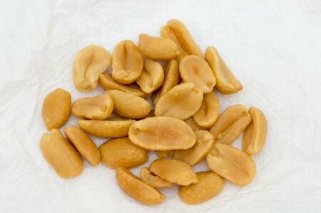 Upper view of roasted ans salted peanuts