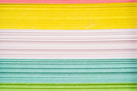 Different color papers in a stackの写真素材