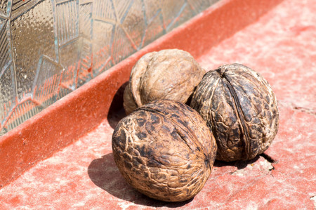 Three walnut close to each other
