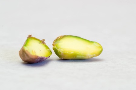 Macro shot of a halved pistachio interiorの写真素材