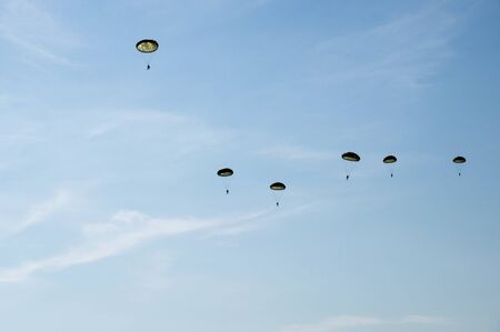 A lot of parachuter in the skyの写真素材
