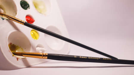 color palette with Brush and mix color red and yellow white Backgroundの写真素材