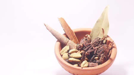 Cloves, Cardamom,Black pepper, Bay leafの写真素材
