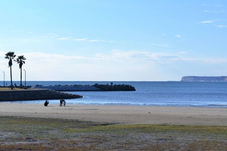 The coast and the family on a sunny afternoonの写真素材