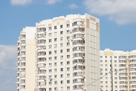 modern dwelling building and blue skyの写真素材