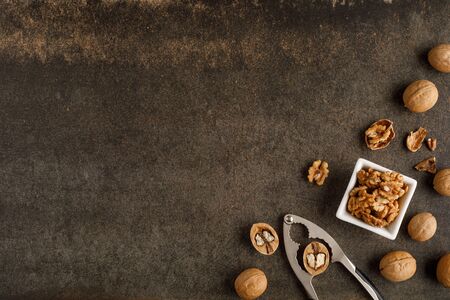frame made of walnut on stone background. Top view. Copy space