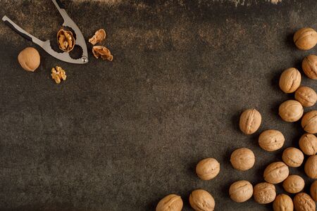 frame made of walnut on stone background. Top view. Copy space