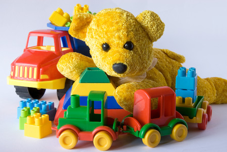 Teddy bear and plastic toysの写真素材