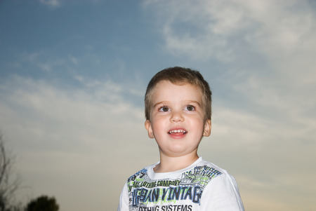 Smiling boy near the lake