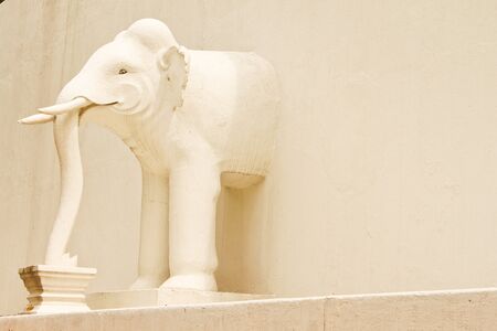 white elephant sculpture in pagodaの写真素材