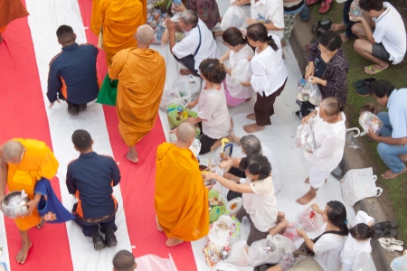 giving alms to monks のeditorial素材