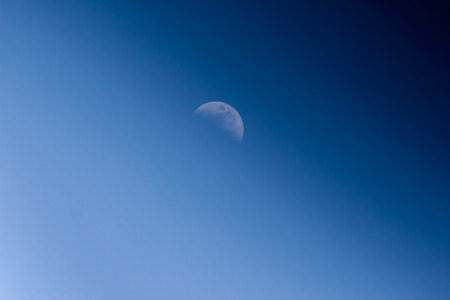 Moon on the blue sky.