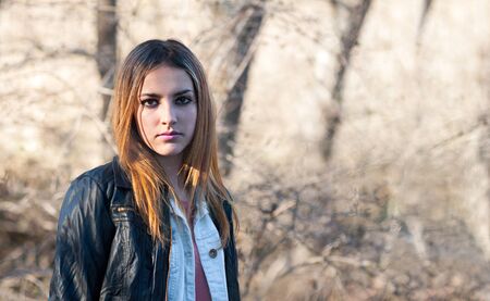 serious look of a pretty teenの写真素材