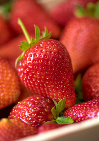 fresh strawberries in wooden box. Close up viewの写真素材
