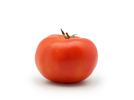 One fresh red tomato isolated on white backgroundの写真素材