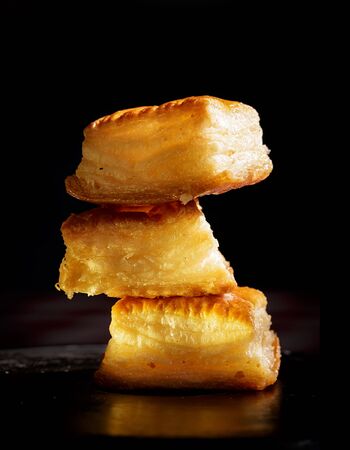 Delicious honey pastries on black backgroundの写真素材