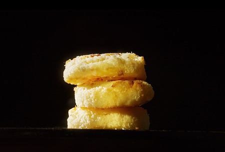 Delicious coconut macaroons on black backgroundの写真素材