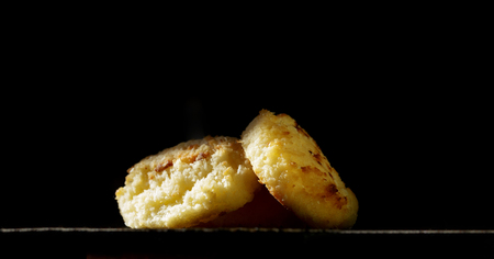 Delicious coconut macaroons on black backgroundの写真素材