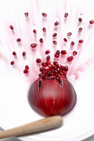 Ripe pomegranate fruit burstingの写真素材