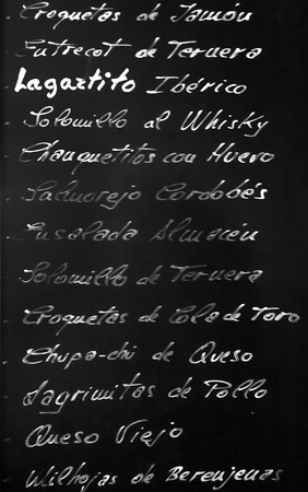 Poster of the menu in a typical Spanish restaurant, Sevilla, Andalusia, Spainの写真素材