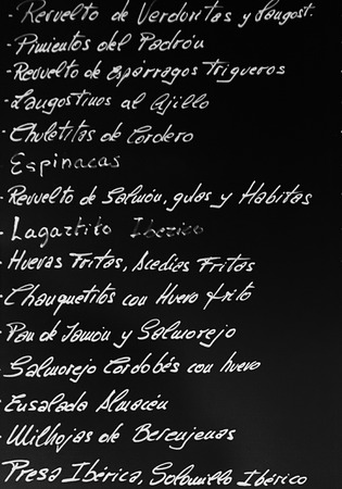 Poster of the menu in a typical Spanish restaurant, Sevilla, Andalusia, Spainの写真素材