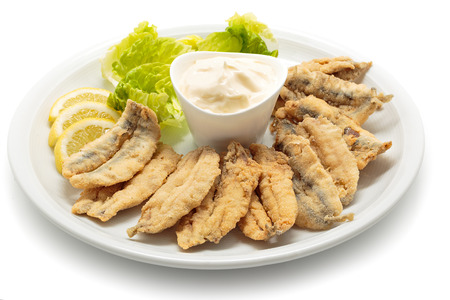 Fried anchovies with salad and mayonnaiseの写真素材