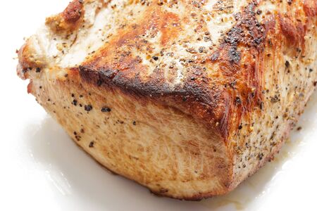 Close-up of Roasted pork on white plateの写真素材