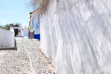 A small alley in the village of Mertola, Portugal. Colors of Portugal Seriesの写真素材
