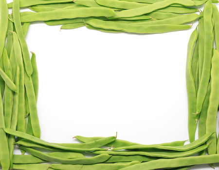Frame of Green beans on whiteの写真素材