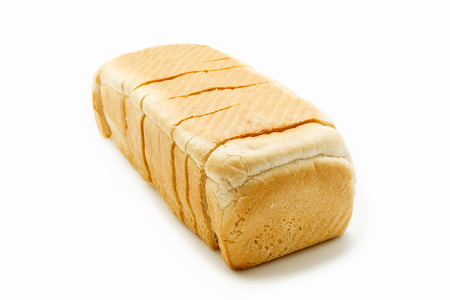 Sliced ??whole bread isolated on white backgroundの写真素材