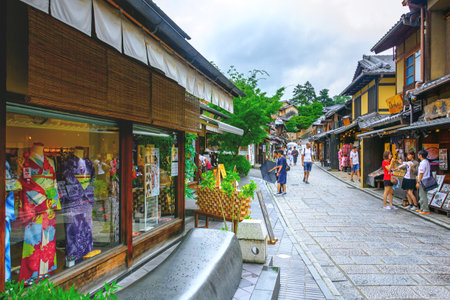 Kyoto, Japan - July 23, 2015: Tourists are enjoying on the Sannen-Zaka, Kyoto famous preserved street on July 21 2015 which located in the Gion district. Many souvenir shops can be found here.のeditorial素材