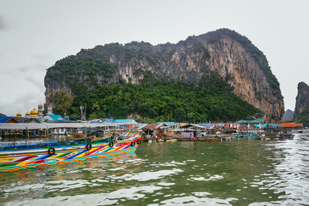 Phang Nga Bay, Thailand - July 30, 2014: Historical floating Koh Panyi settlement, also known as Koh Panyee, muslim fishing village built on stilts of Phang Nga Bay, Krabi, Thailand.のeditorial素材