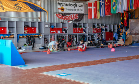Seville, Spain - May 7, 2016: Group of skydivers preparing for jumping event, checking equipment. Skydive Spain preparation area. Skydive Spain is the skydiving center located at La Juliana Aerodrome, about 20 km southwest of Seville, Spain. At Skydive Spのeditorial素材