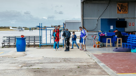 Seville, Spain - May 7, 2016: Group of skydivers preparing for jumping event. Skydive Spain preparation area. Skydive Spain is the skydiving center located at La Juliana Aerodrome, about 20 km southwest of Seville, Spain. At Skydive Spain they fly up to 1のeditorial素材