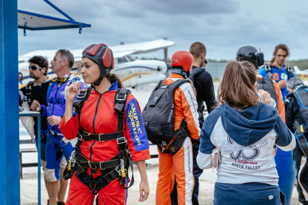 Seville, Spain - May 7, 2016: Beautiful woman prepares to skydive. Skydive Spain is the skydiving center located at La Juliana Aerodrome, about 20 km southwest of Seville, Spain. At Skydive Spain they fly up to 15,000ft, the highest altitude in Europe andのeditorial素材