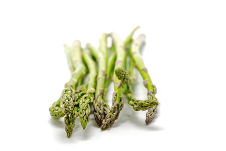 Green asparagus isolated on whiteの写真素材